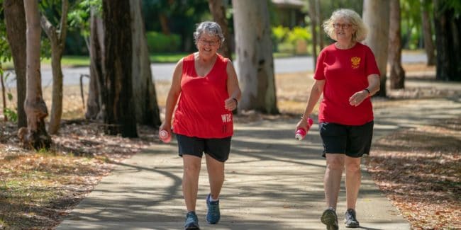 Two women walking together