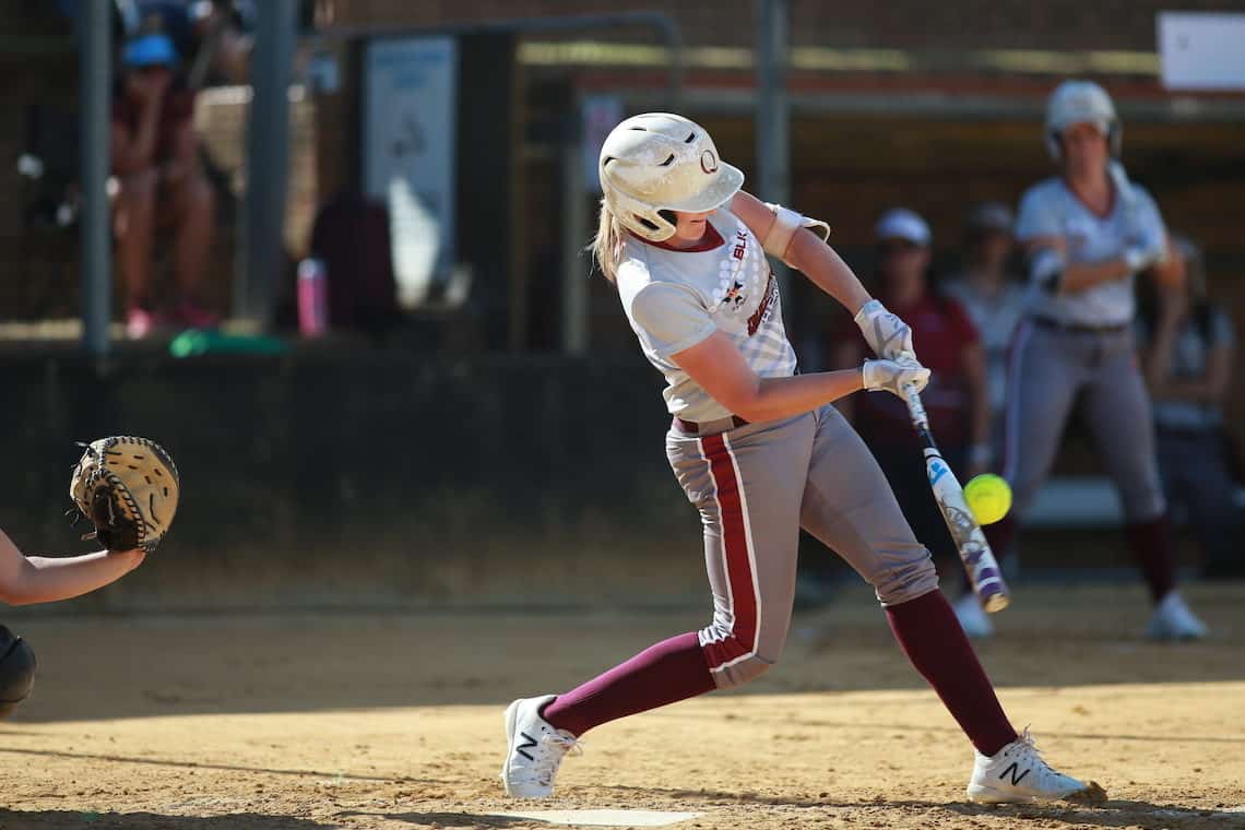 Softball player hitting a ball, Softball Queensland