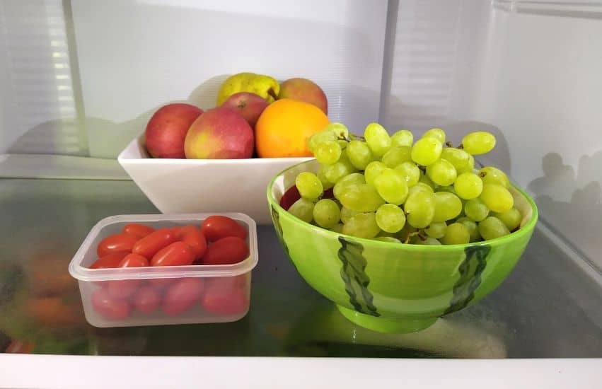 Fruit and cherry tomatoes ready to eat from the fridge