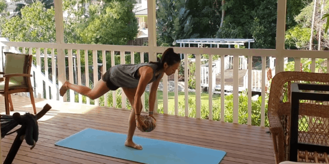 Exercise physiologist demonstrating exercises with a pumpkin