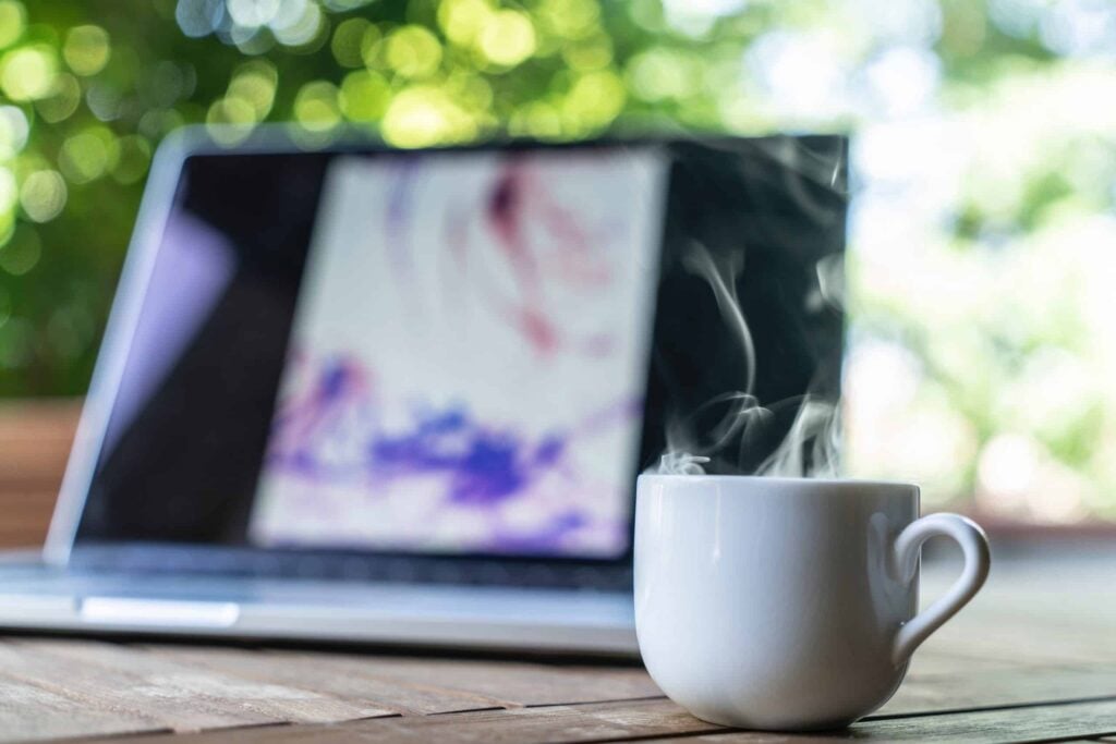 Laptop and mug on a table