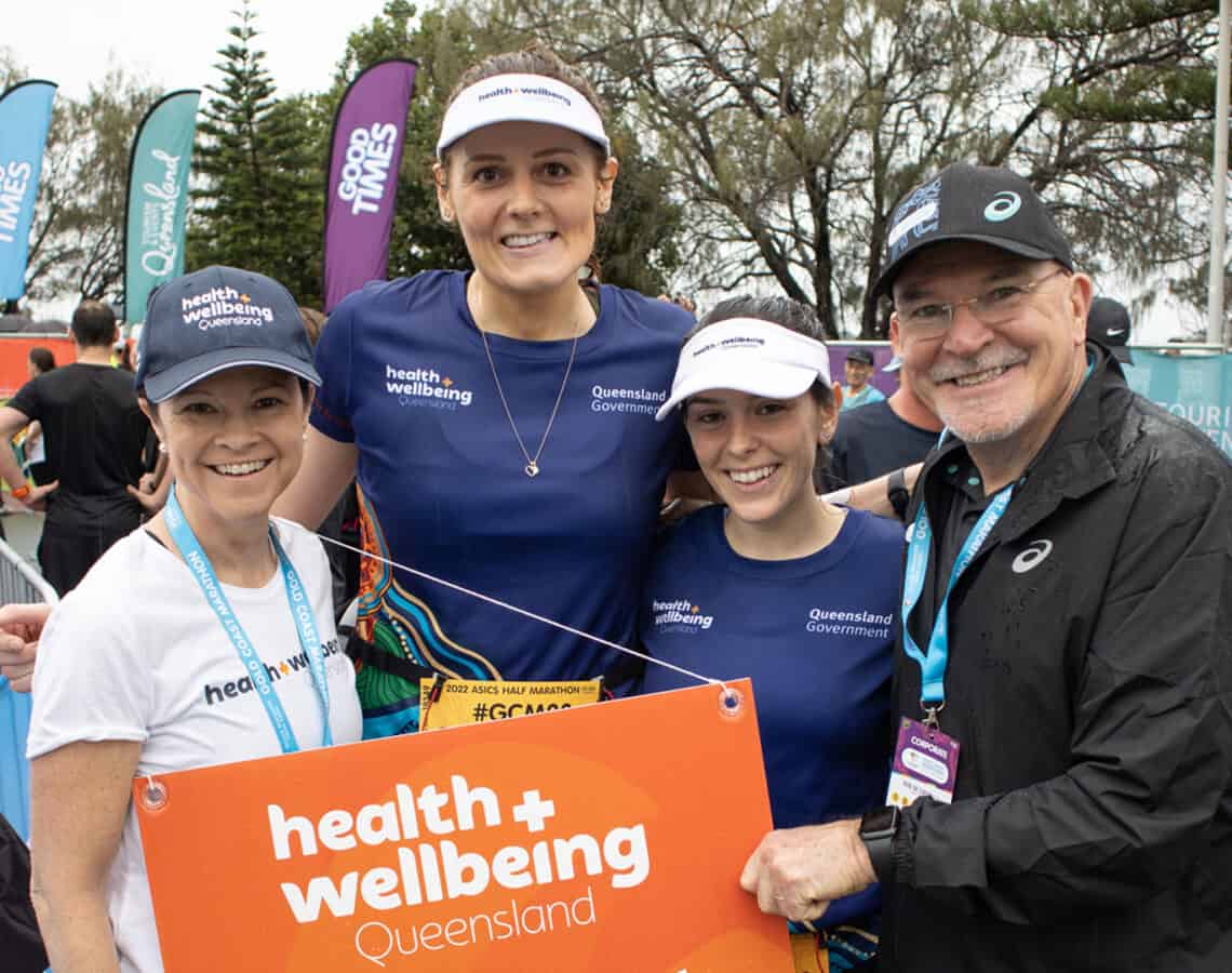 Robyn Littlewood and Robert de Castella with 2 runners at the Gold Coast Marathon