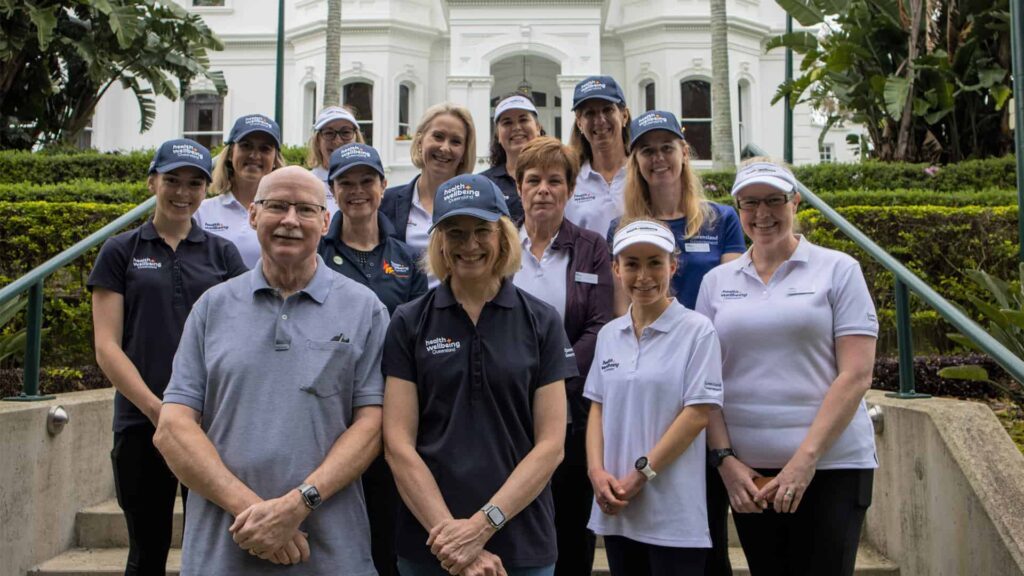 HWQld staff pictured with Dr Jeannette Young at Government House for a Community Walk