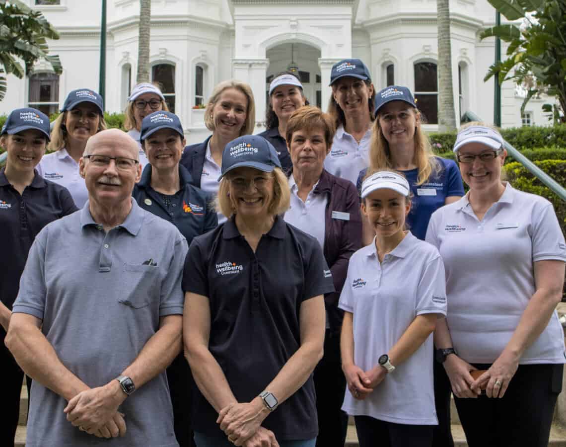 HWQld staff pictured with Dr Jeannette Young at Government House for a Community Walk