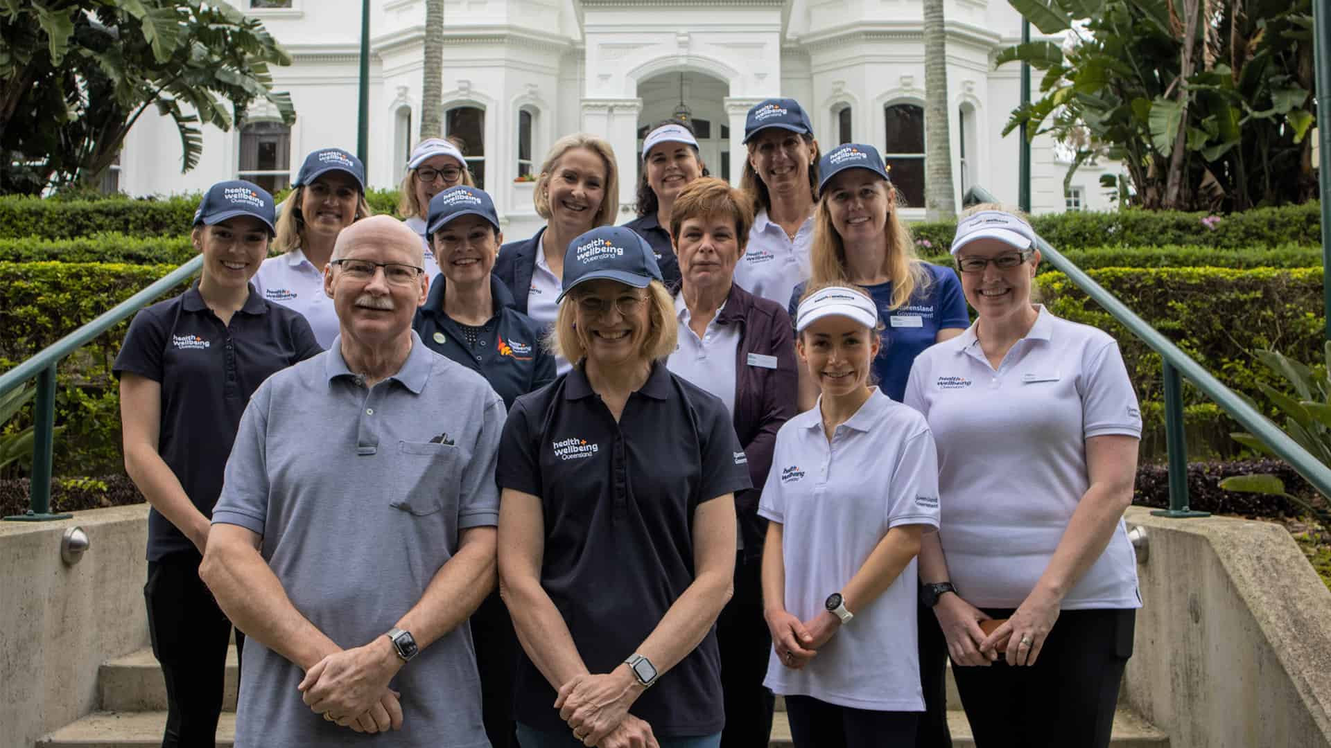 HWQld staff pictured with Dr Jeannette Young at Government House for a Community Walk
