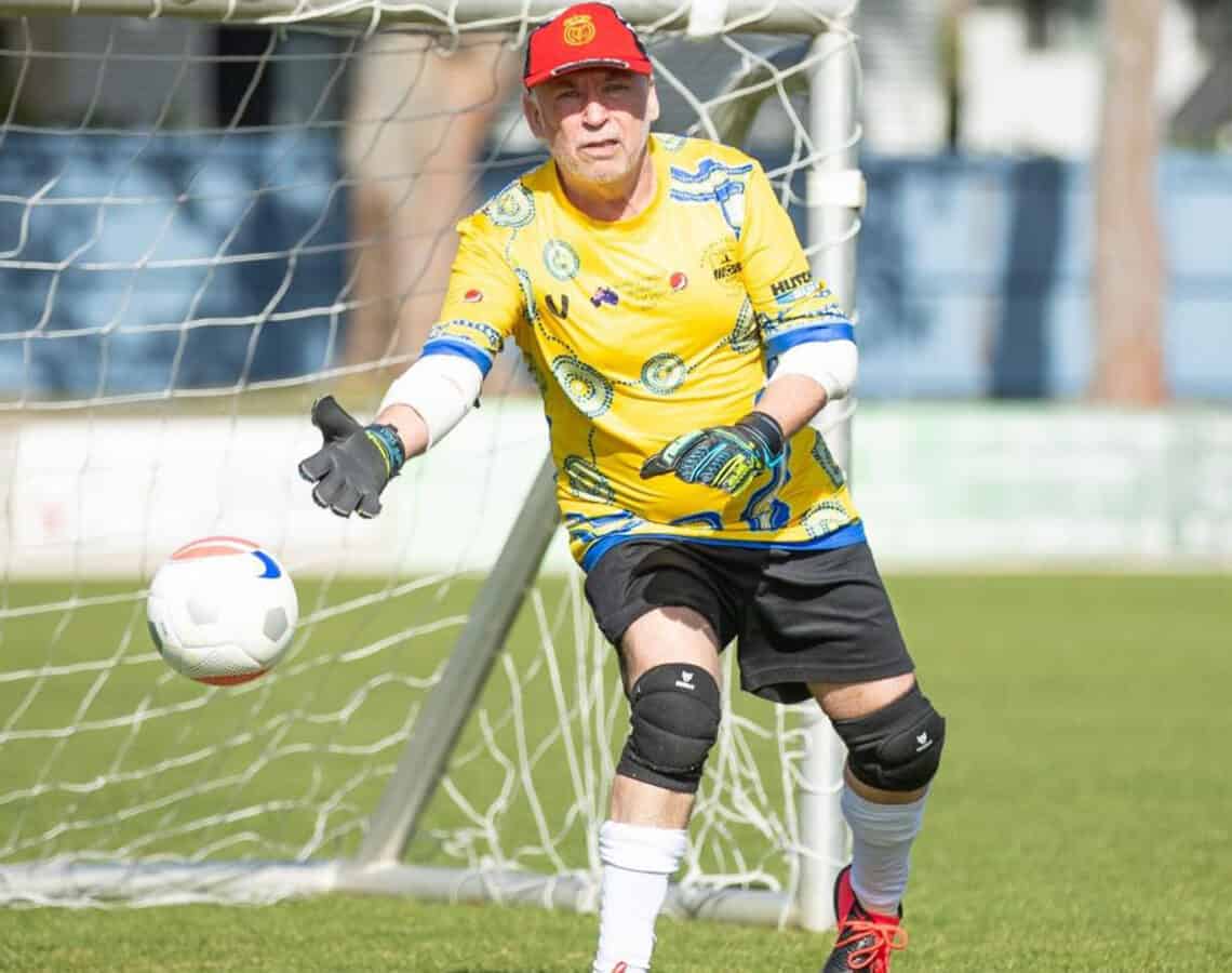 Anthony Pollock defending the goal post in a goal in walking football