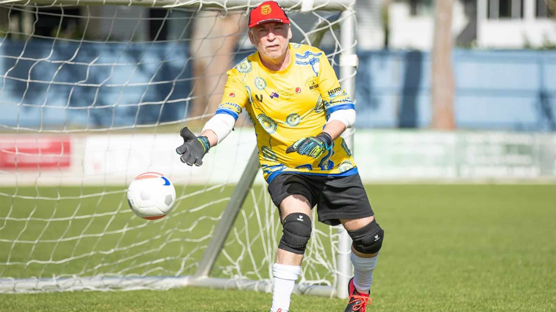 Anthony Pollock defending the goal post in a goal in walking football