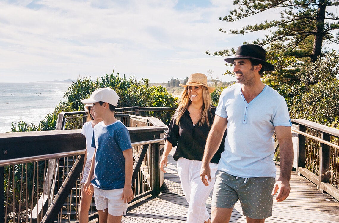 Family of four going on a family walk