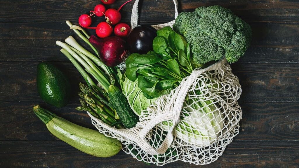 String bag of mixed, whole vegetables