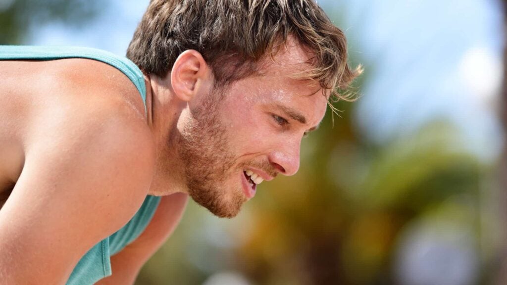 Young man sweating from exercise