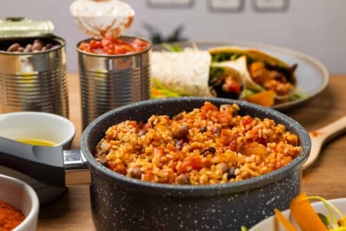 A bit pot filled with beans and rice