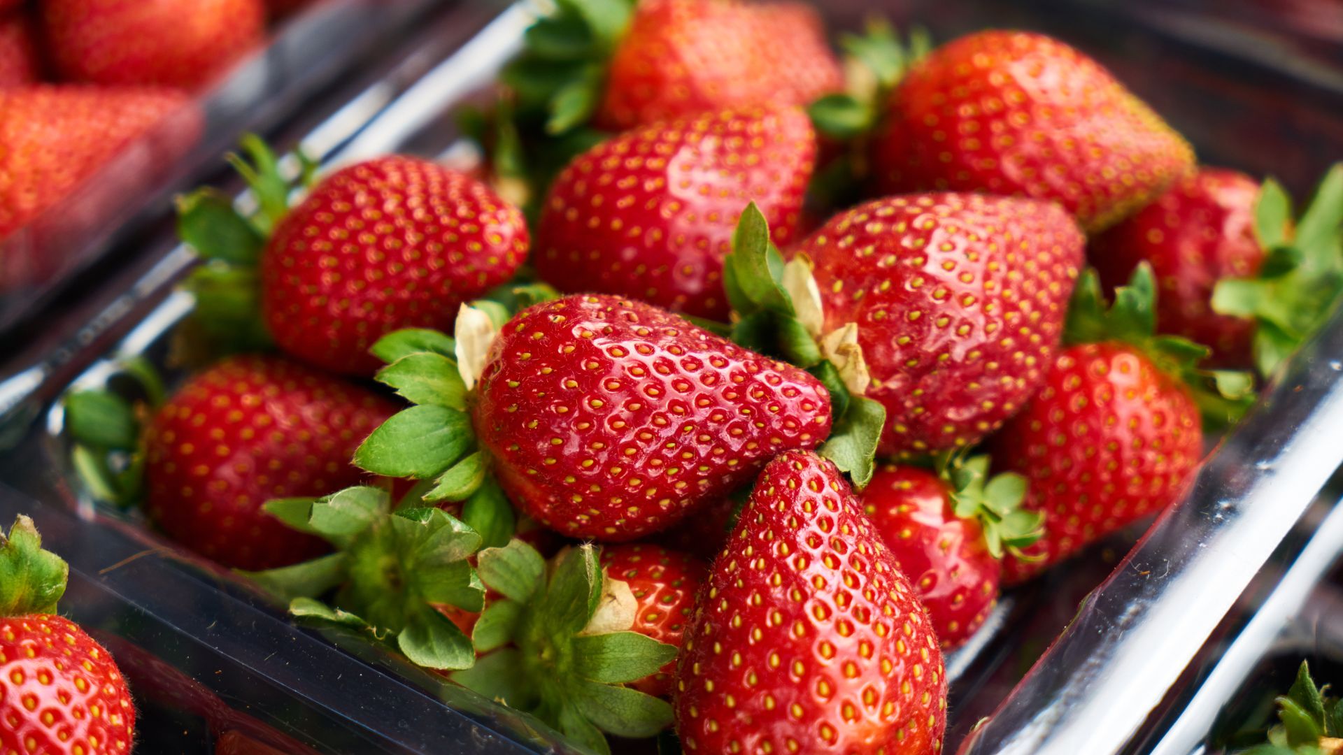 A punnet of strawberries.