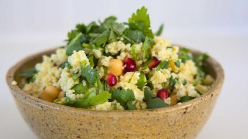 Pomegranate and couscous salad in a bowl