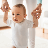 A baby learning to walk