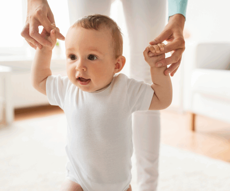 A baby learning to walk