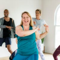 People dancing in a fitness class