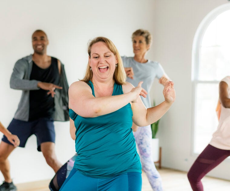 People dancing in a fitness class