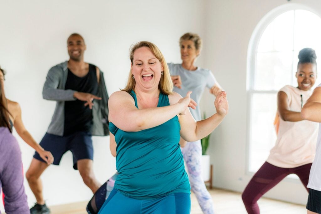 People dancing in a fitness class