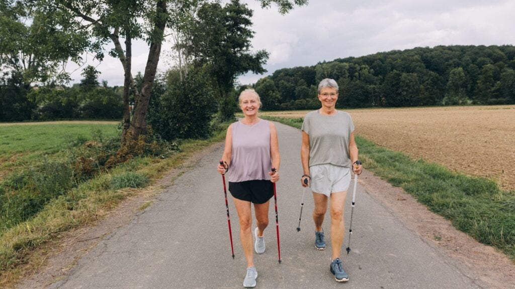 two people walking outside