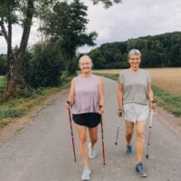 two people walking outside