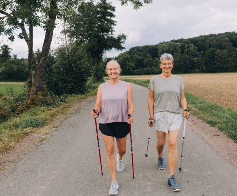 two people walking outside