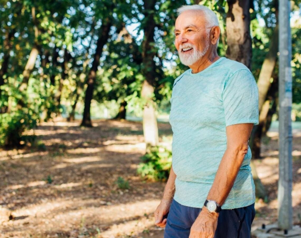Mature man walking in the woods