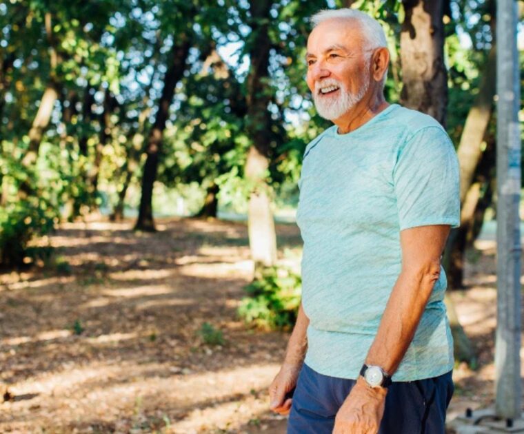 Mature man walking in the woods