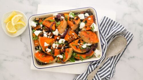 Roast pumpkin wedges sprinkled with feta cheese