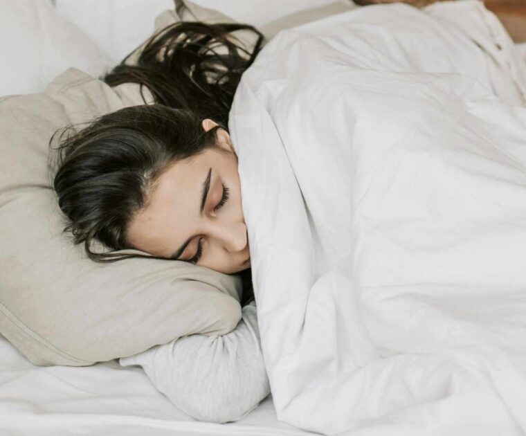 Women sleeping in bed