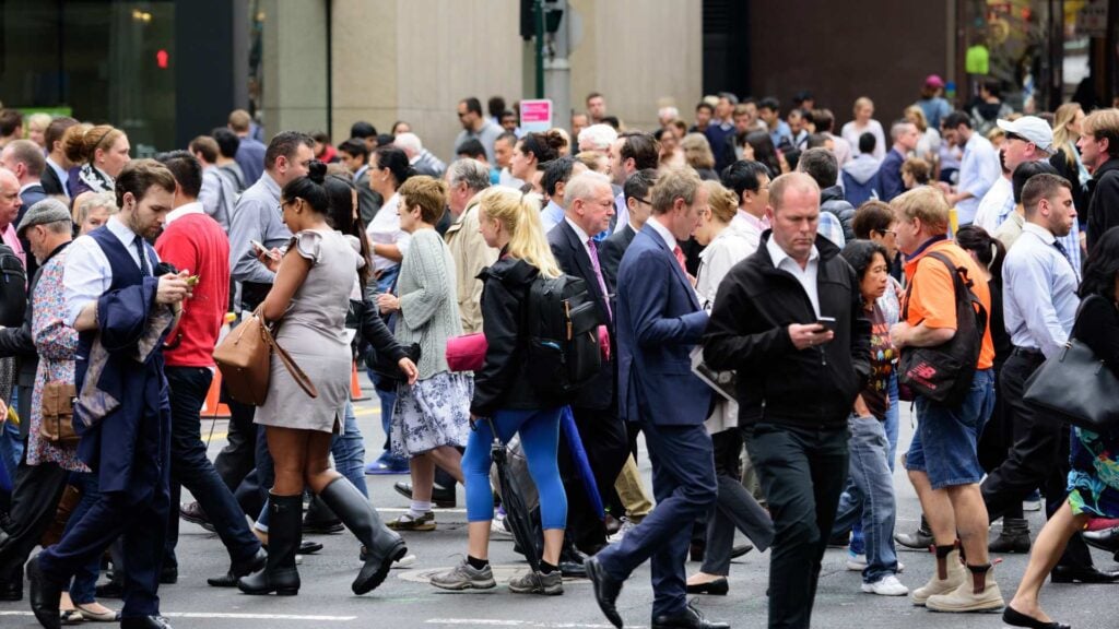 A crowd of busy commuters