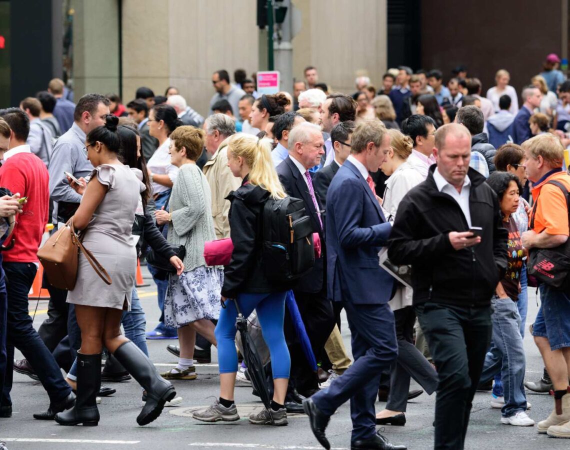 A crowd of busy commuters