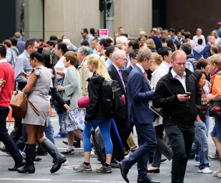 A crowd of busy commuters