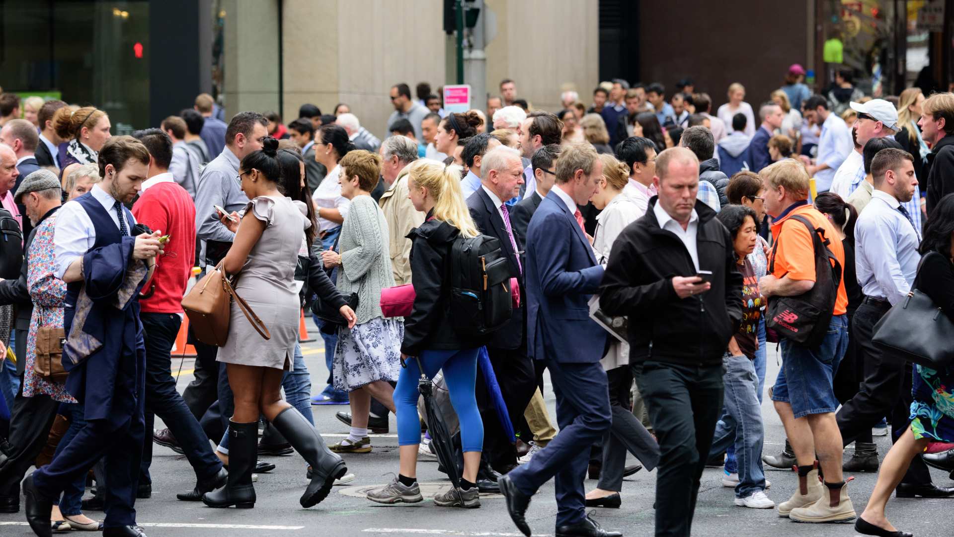 A crowd of busy commuters