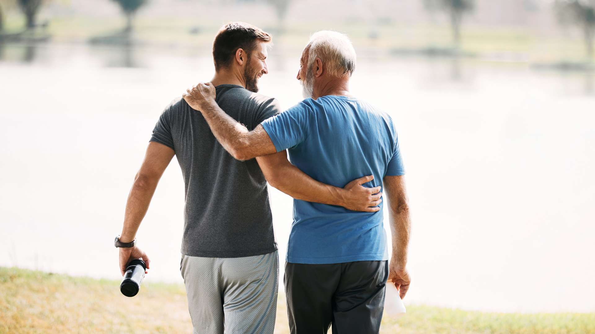 Two men support one another