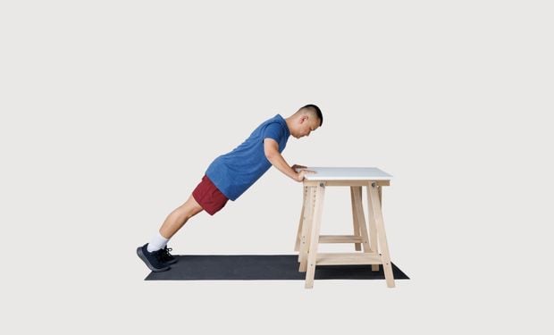 Incline push up using desk
