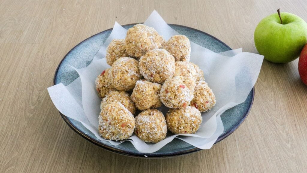 Apple cinnamon bliss balls in a bowl