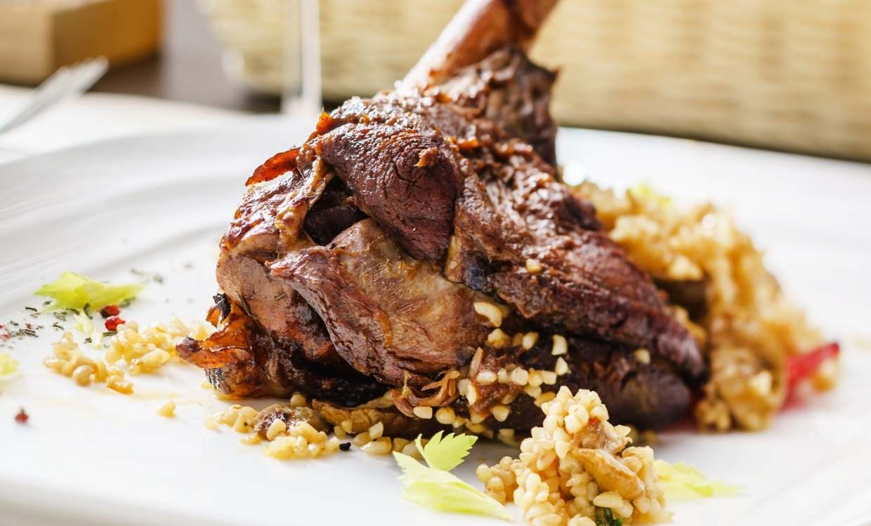Lamb shank on a bed of cous cous