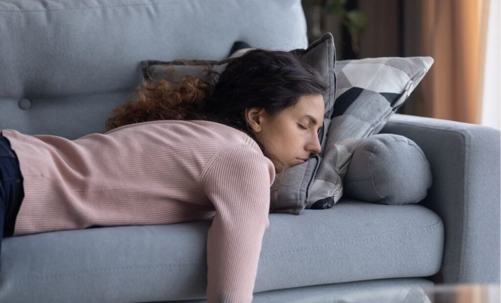 Woman asleep on couch