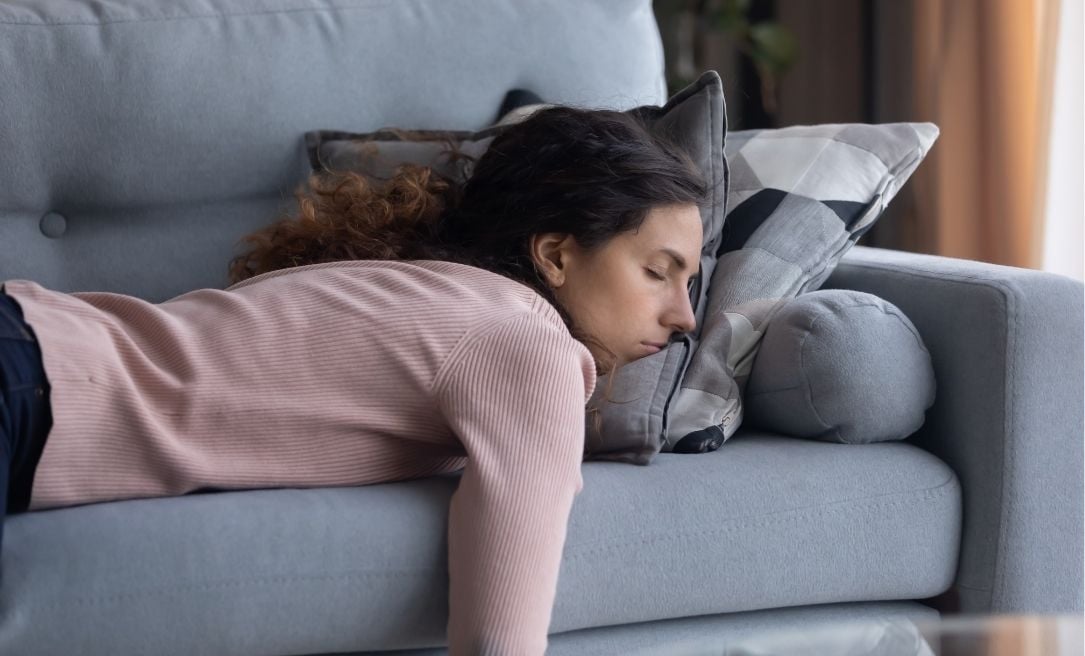 Woman asleep on couch