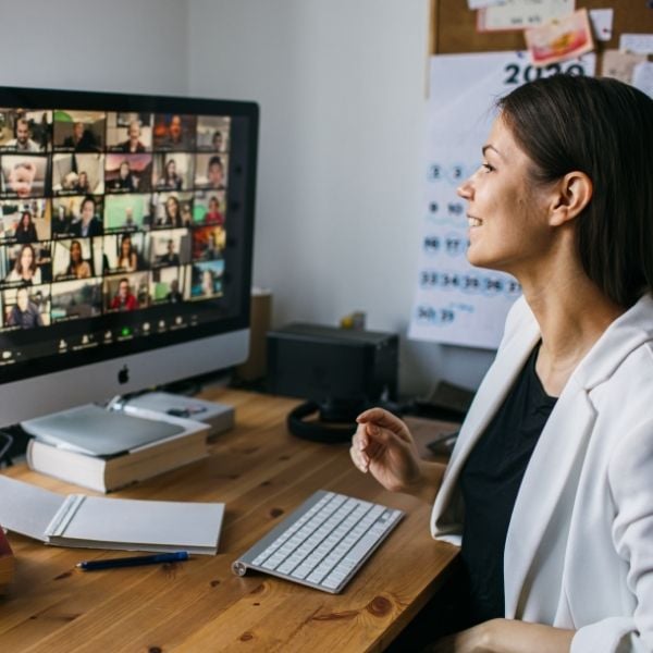 A woman at her desk joining an ECHO Learning Series webinar on her computer